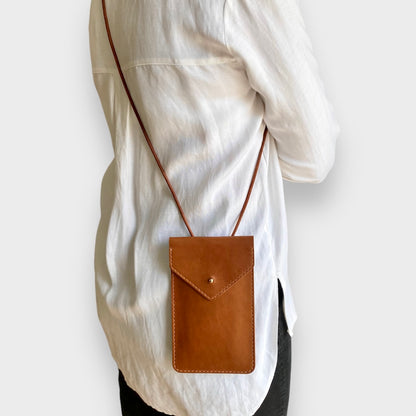 Leather phone sling bag in brown